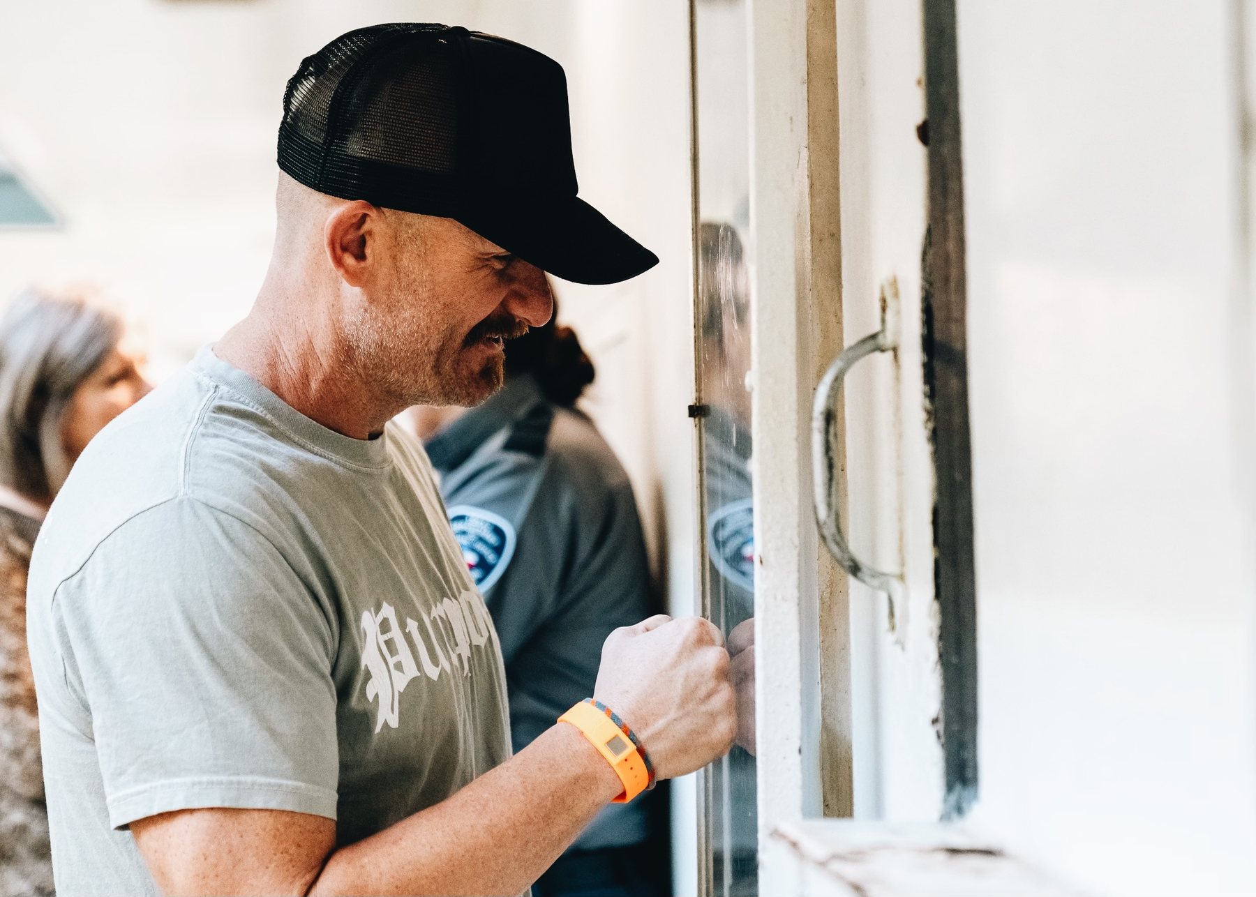 Justin sharing a personal moment with someone at a ministry event